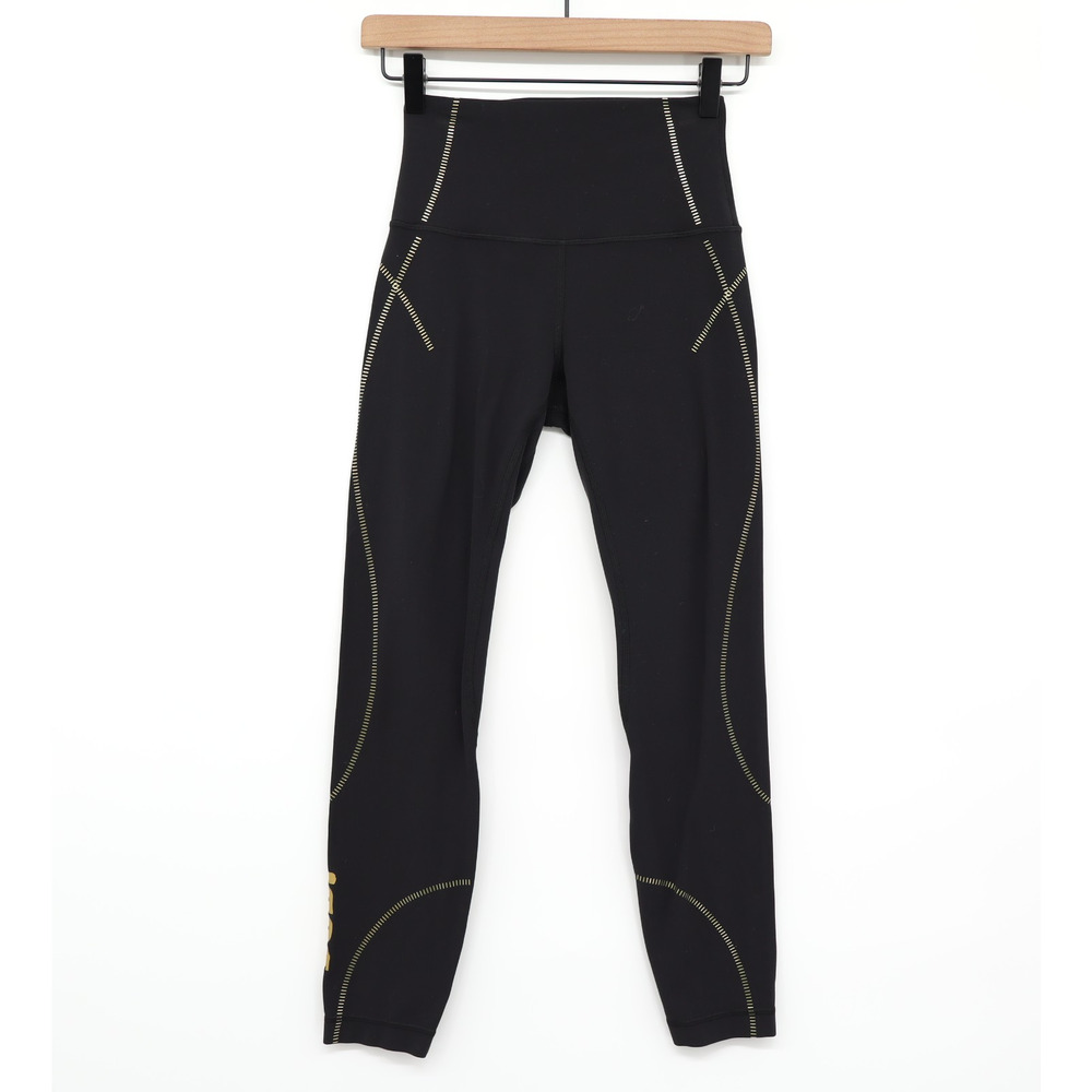 Lululemon Women's Align Highrise pant 25" Inseam Gold Details Black Sz 4